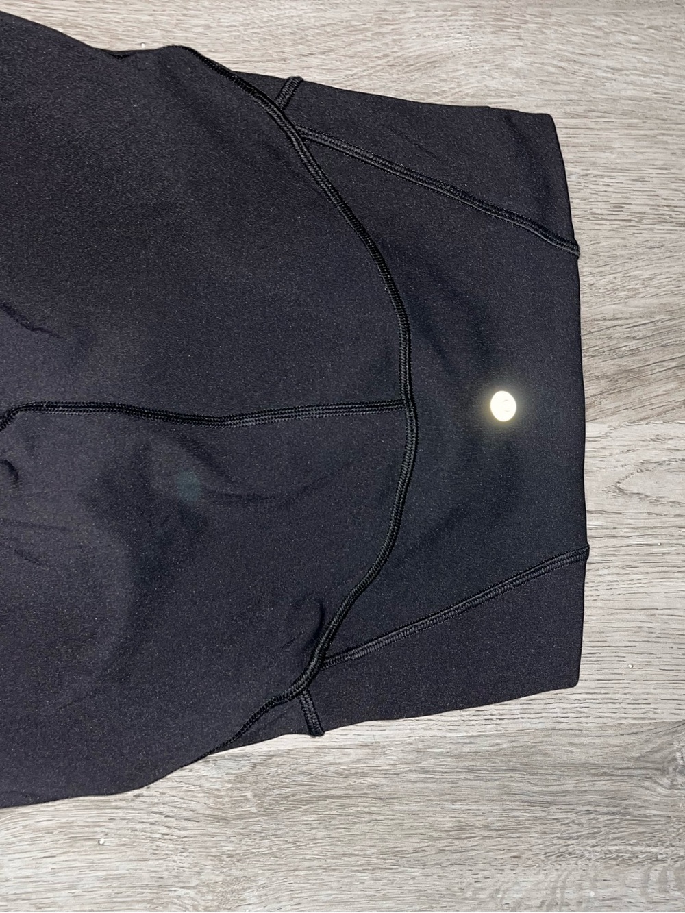 High-Waist Black Lululemon Performance Leggings with Mesh Detailing